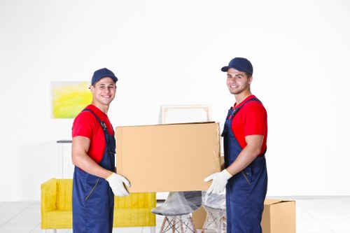 Removal van and moving boxes prepared for a house move in Aldersbrook
