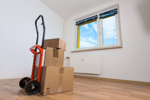 Prepared office workspace with boxes and furniture ready for relocation