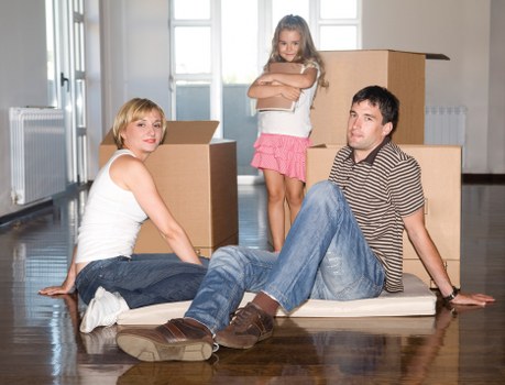 Packed boxes and furniture ready for transport